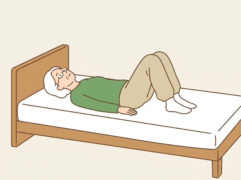 あおむけで両膝を立て、足の裏をベッドにつけた姿勢