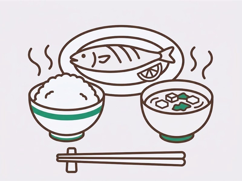 車いすで食事をする高齢の方と、横で見守る家族のイメージ
